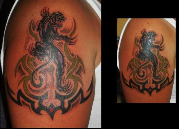BLACK TRADITIONAL PANTHER tattoo
