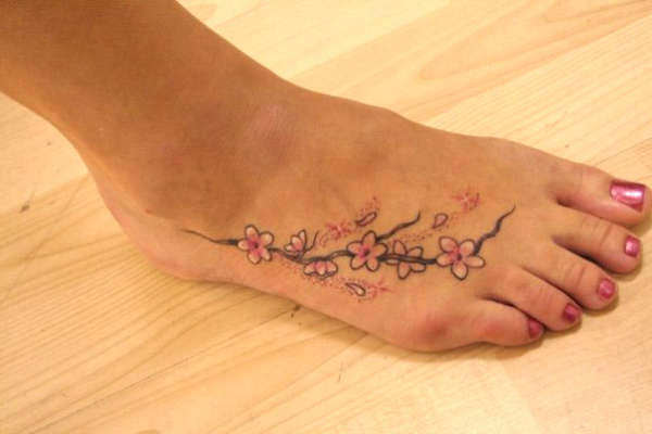 foot chain tattoo