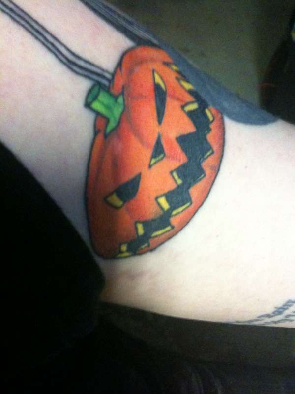 Close up of Pumpkin tattoo