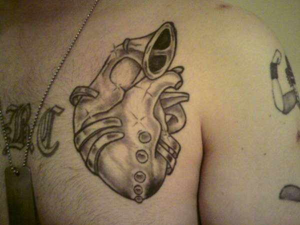 Heart Trumpet tattoo