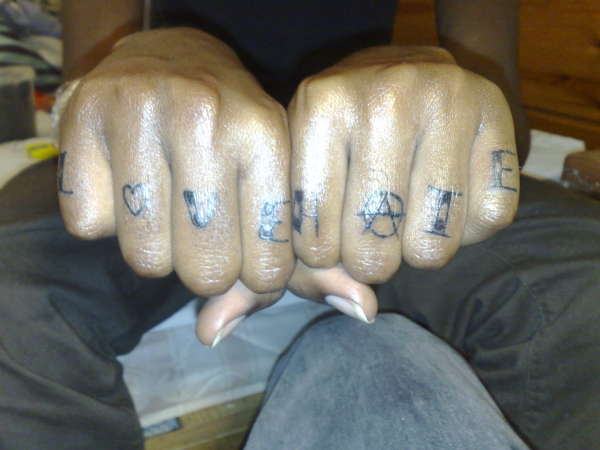Love Hate on knuckles tattoo