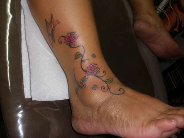 butterflie and dragonflie   in foot tattoo