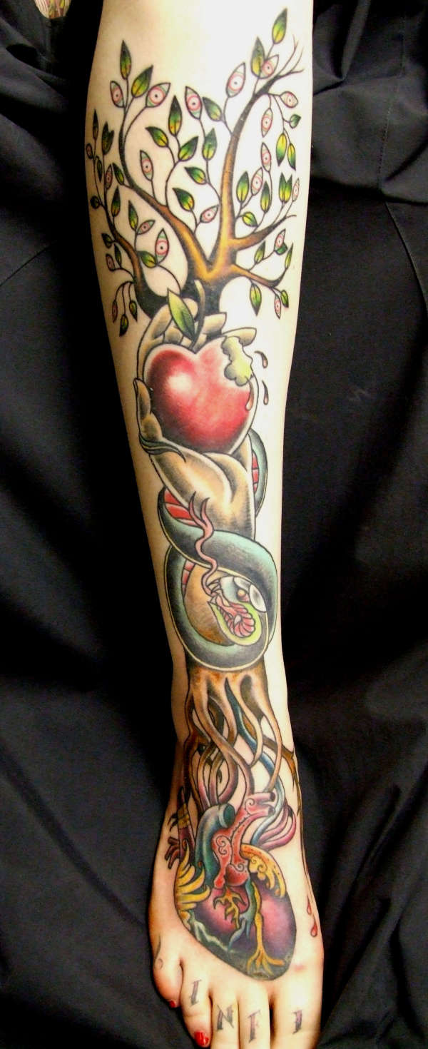 custom apple of wisdom tattoo