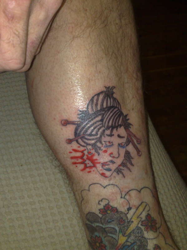 dead geisha head tattoo