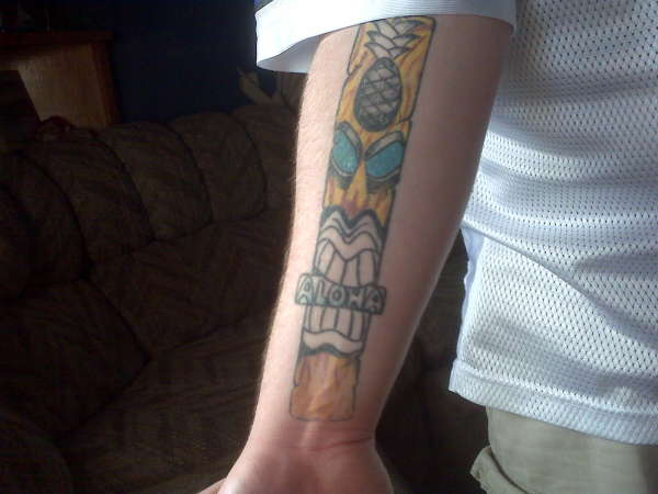 my tikitat on my arm tattoo