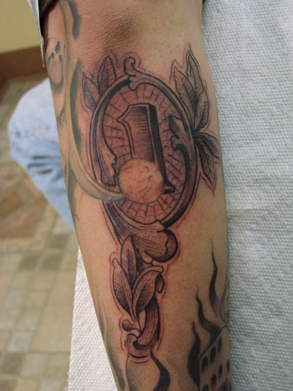tattoo by: Slick Rick tattoo