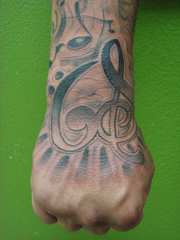 tattoos by: Slick Rick tattoo