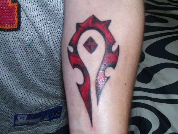 FOR THE HORDE on forearm tattoo