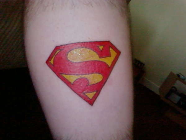 Superman logo tattoo