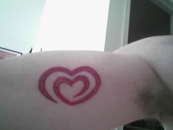 inner bicep heart tattoo