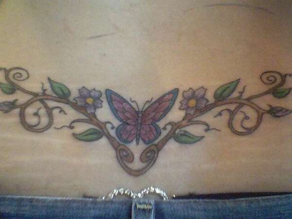 butterfly lower back tat tattoo