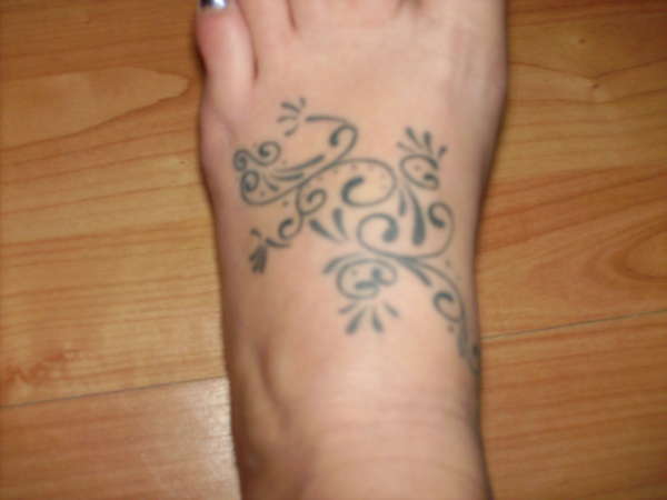 lizard on foot tattoo