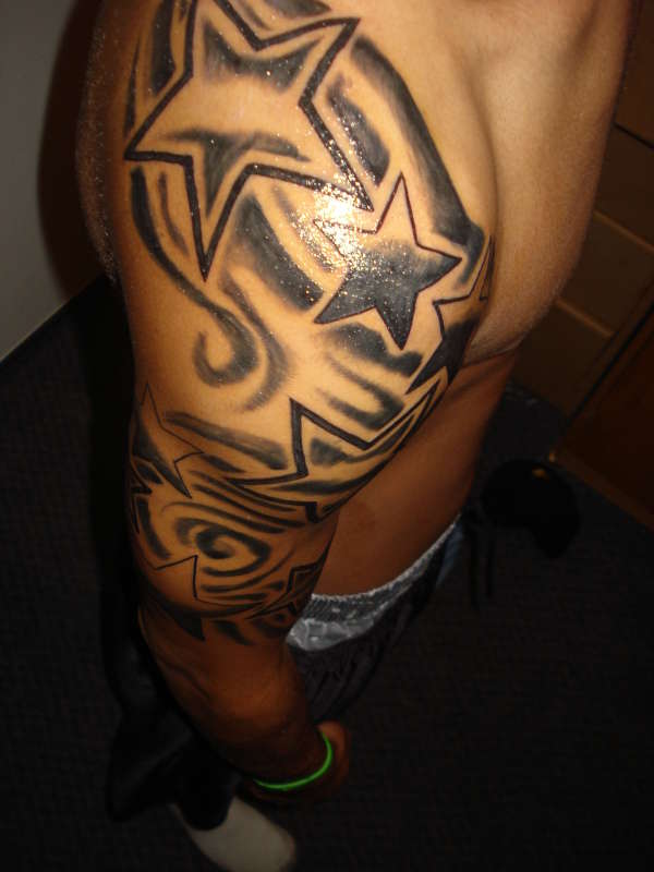 start of shooting star sleeve tattoo