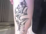 tribal knife tattoo