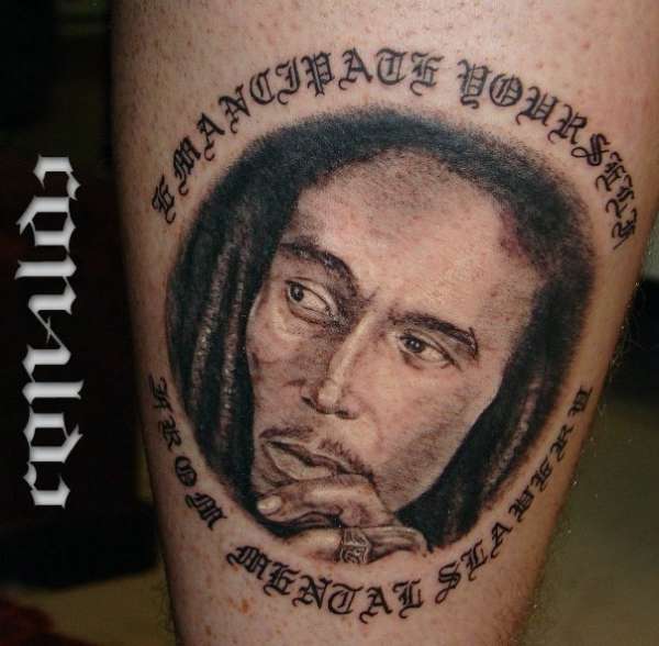 Back of left leg tattoo
