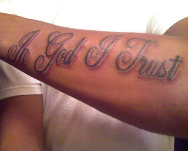 In God I Trust tattoo.
