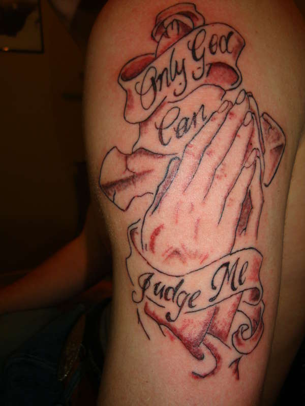 Praying hands tattoo