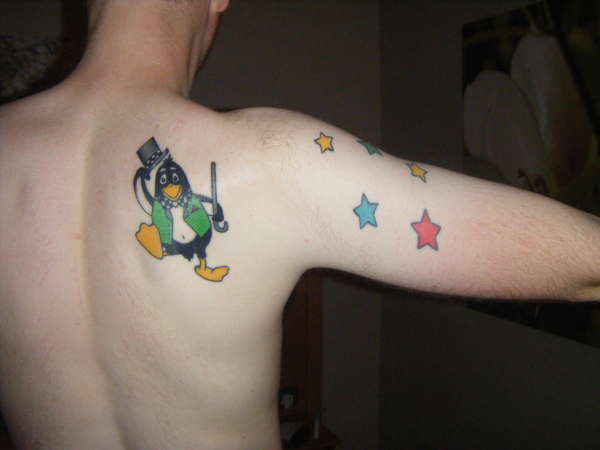 Stars and a Penguin tattoo