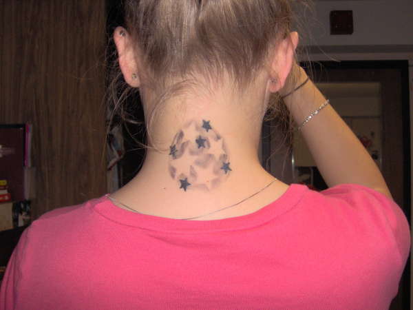 Stars on neck tattoo