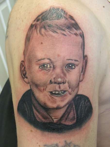 childs portrait tattoo