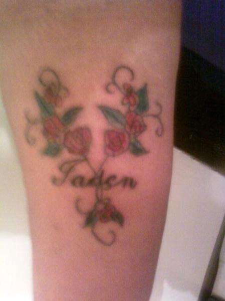 flower and name tattoo