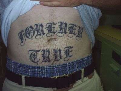 Stomach "Forever True" tattoo