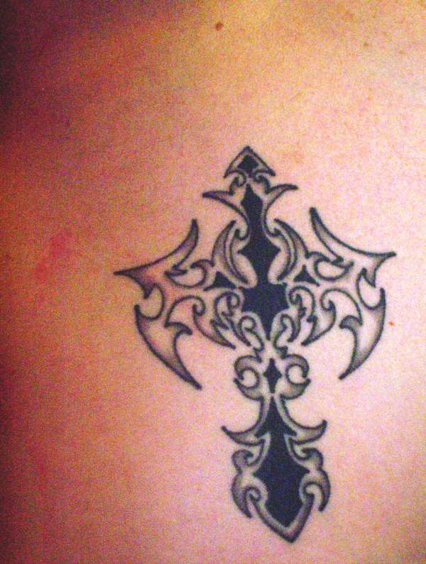 Tribal cross tattoo