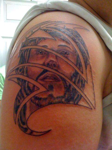 jesus with tribal tattoo