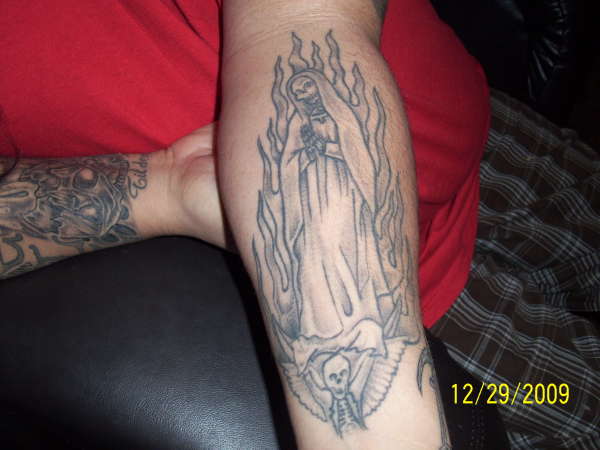 left arm tattoo