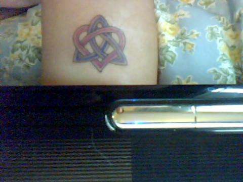 love & faith celtic symbol tattoo