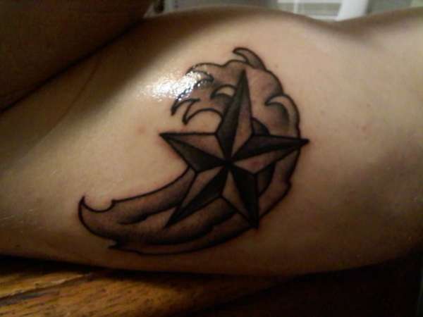 nautical in a wave tattoo