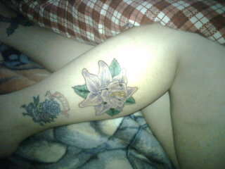 start of a flower sleeve tattoo