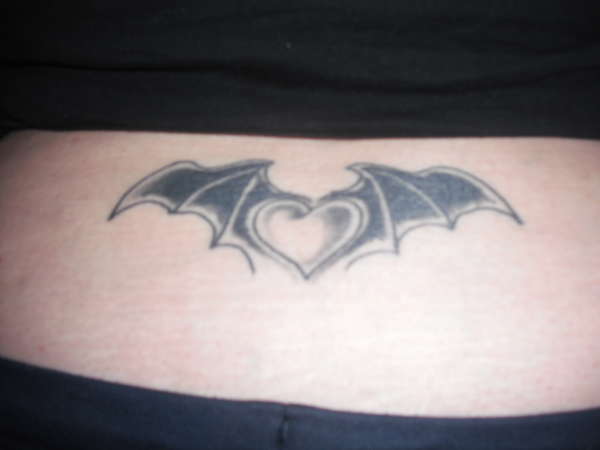 Bat Wings with Heart (healed) tattoo