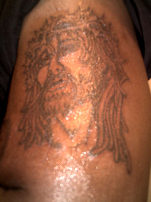 Black Jesus tattoo