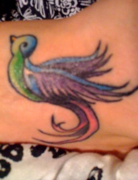 Peace sparrow on my foot tattoo