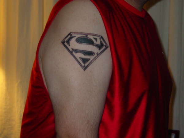 Superman tat tattoo