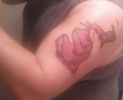 Woodgrain Michigan tattoo