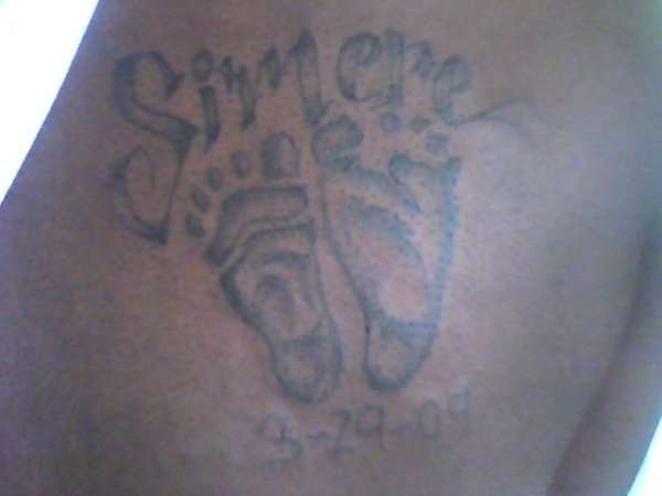 baby feet tattoo
