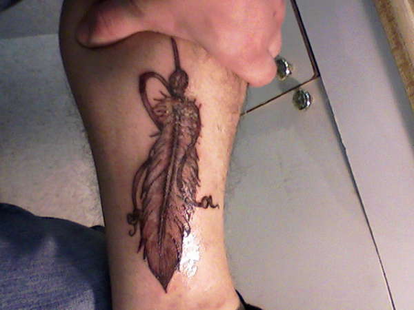 custom feather tattoo