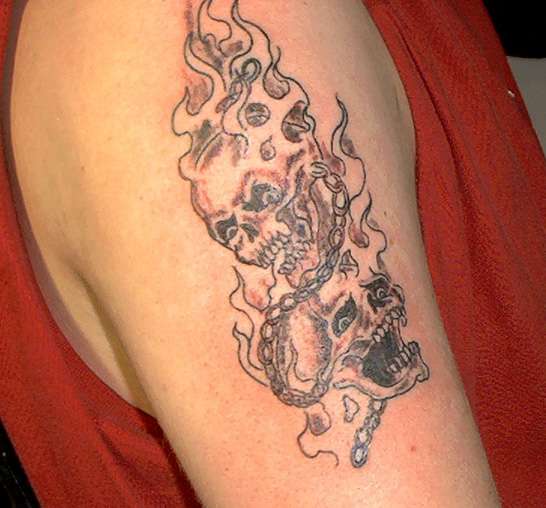 2 skulls tattoo