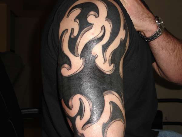 tribal flame tattoo