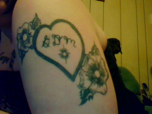 flowers n heart "my left arm" tattoo