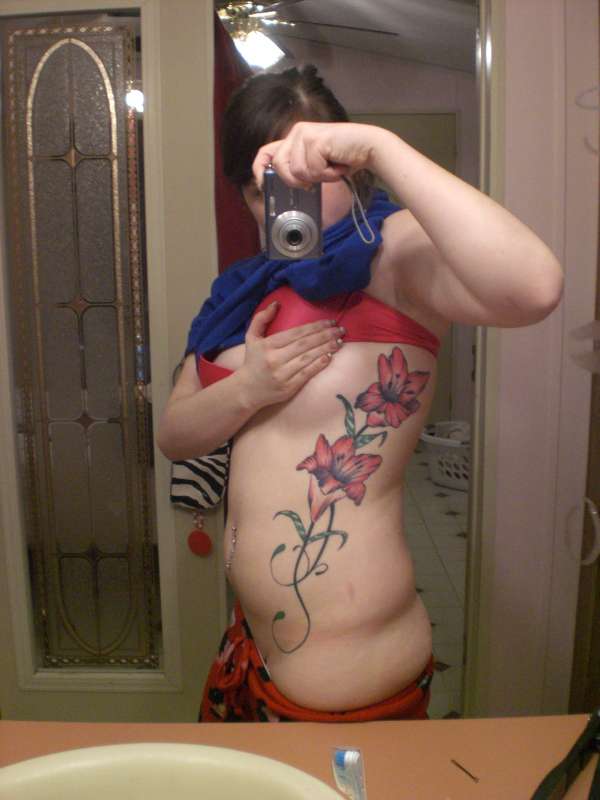 my tiger lillies down my right side;; tattoo