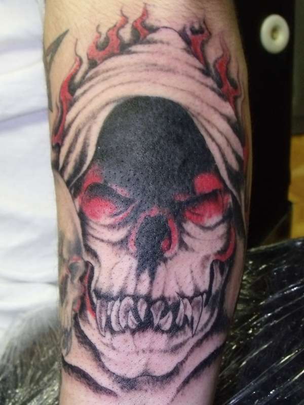 skull/reaper tattoo