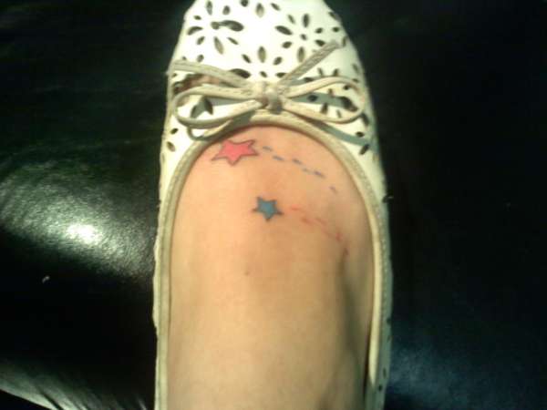 stars on foot tattoo