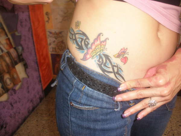 BUTTERFLY WITH TRIBAL STYLE tattoo