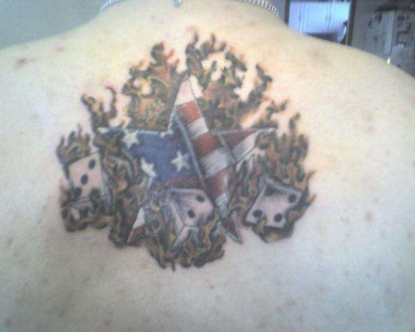 Burning Star with Dice tattoo