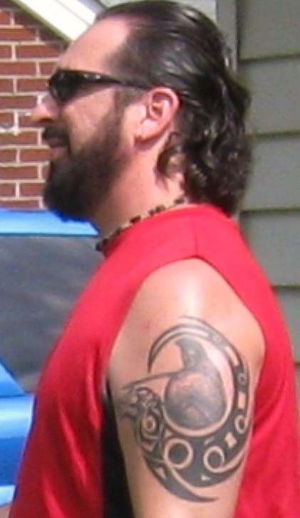 Leonidas with tribal wolf tattoo