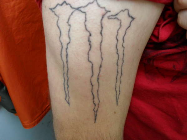 monster logo outline tattoo