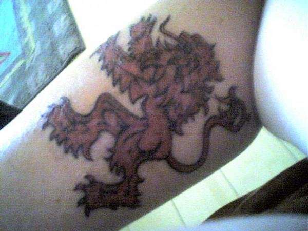 Scottish battle lion tattoo